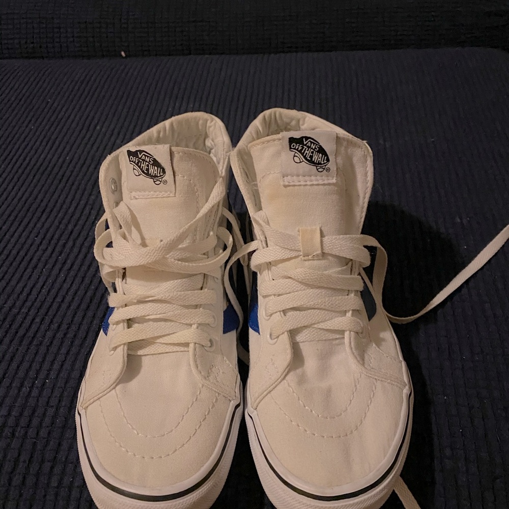 White high top vans with blue accent the white